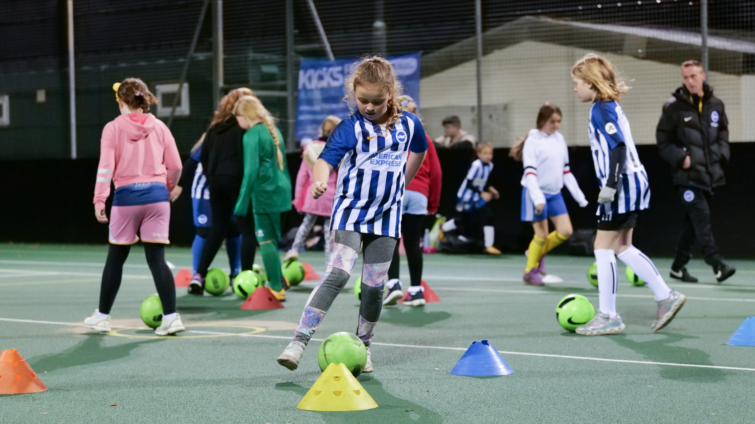 girls doing football exercise