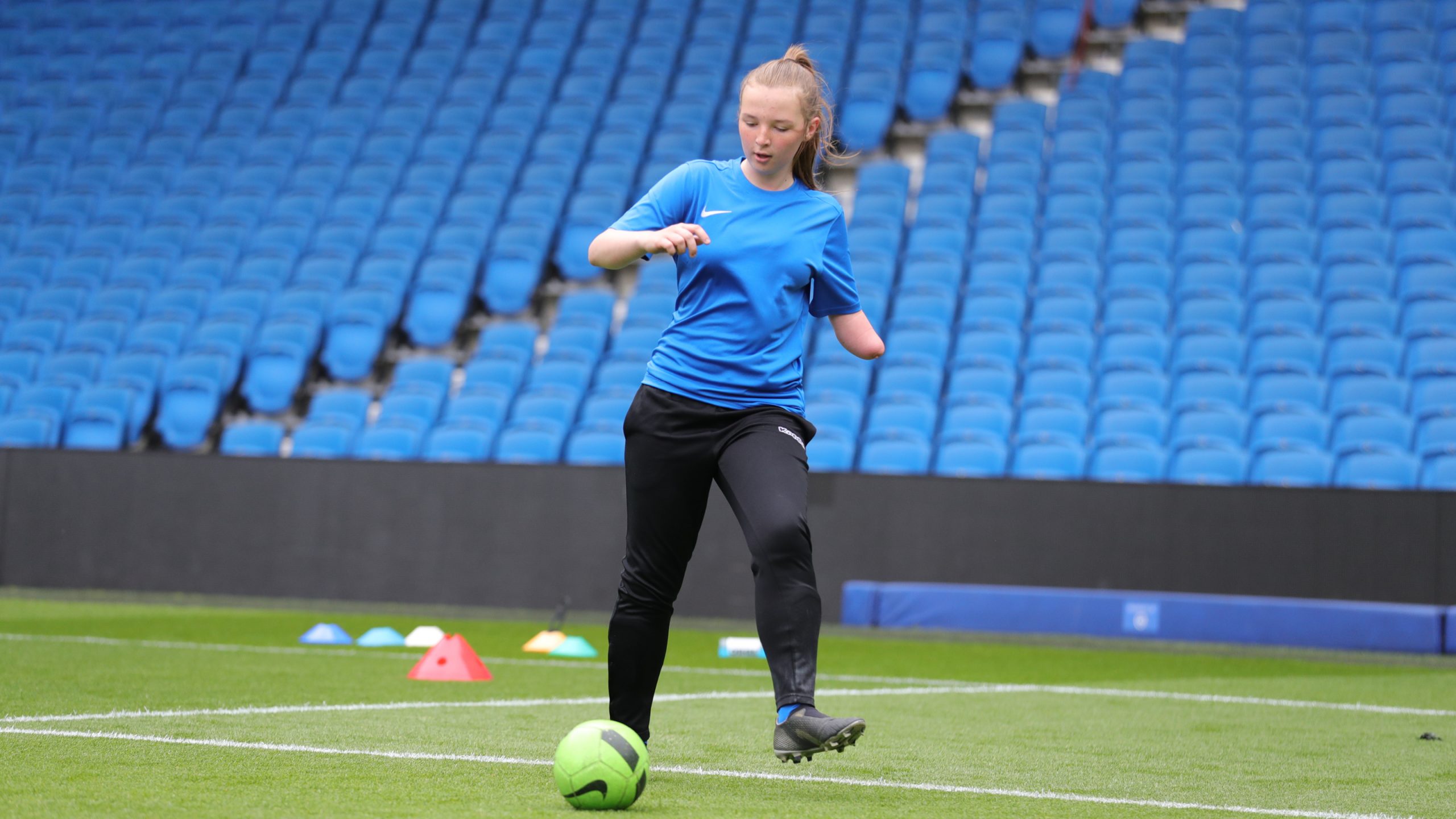 girl playing football