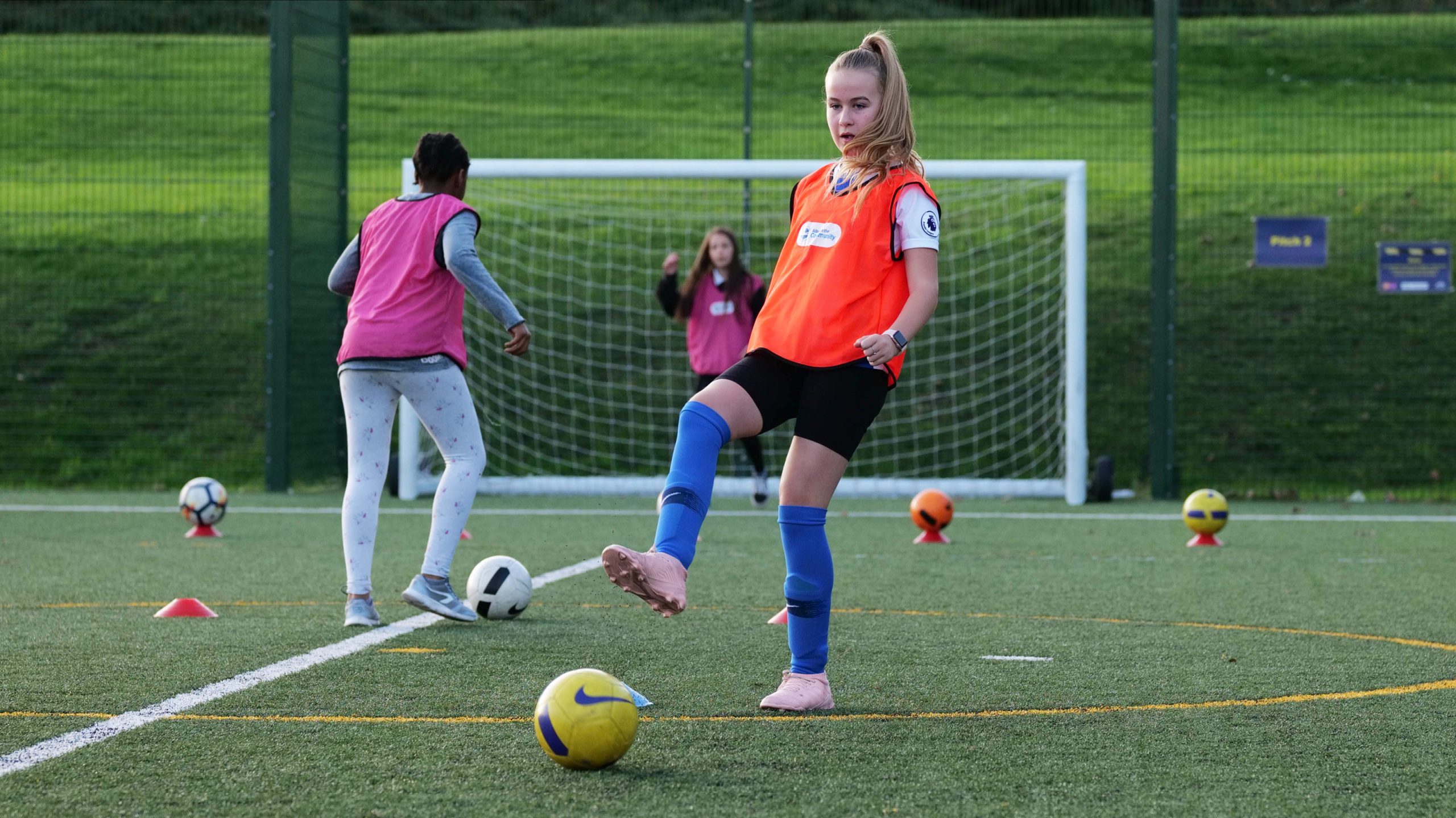 girls playing football